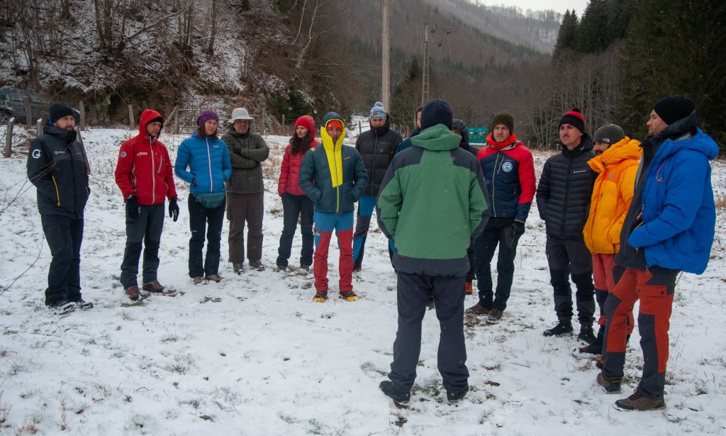 Training session with the guides at the tree nursery in the snow - part of the Carpathia Guiding Academy