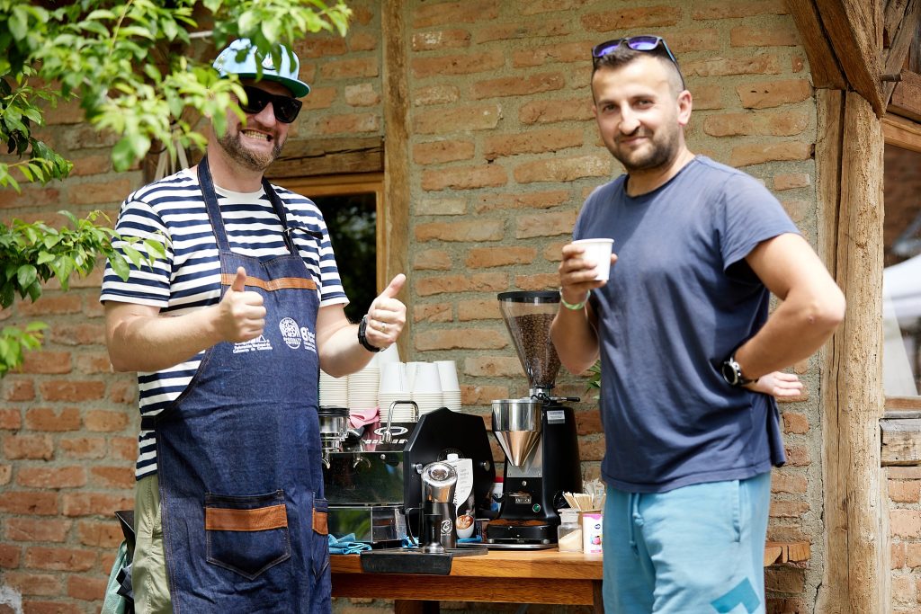Barista serving coffee at Cobor Între Stejari festival